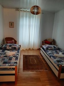 Postel nebo postele na pokoji v ubytování Bergwelten