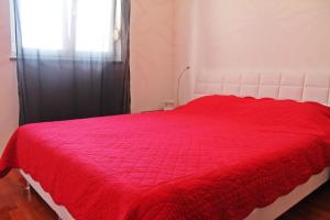 Posteľ alebo postele v izbe v ubytovaní Apartments Jadran