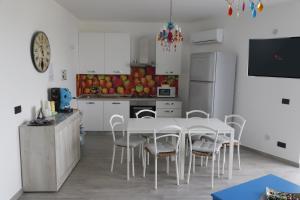 A kitchen or kitchenette at Assabinirica