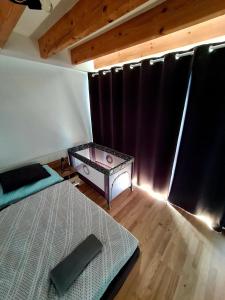 A bed or beds in a room at Hakuna Matata