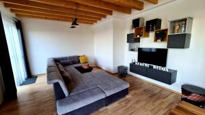A television and/or entertainment centre at Hakuna Matata
