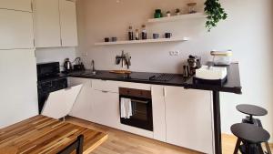A kitchen or kitchenette at Hakuna Matata