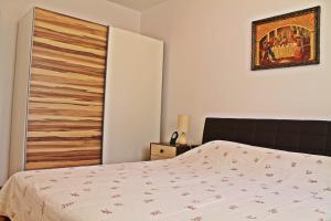 Posteľ alebo postele v izbe v ubytovaní Apartments Jadran