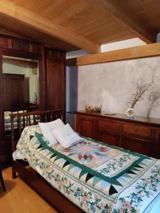Posteľ alebo postele v izbe v ubytovaní Casa Costanza