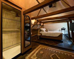 Postel nebo postele na pokoji v ubytování Boutique Hotel & Restaurant Frenchie