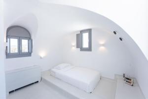 Posteľ alebo postele v izbe v ubytovaní Philosophia Luxury Villa
