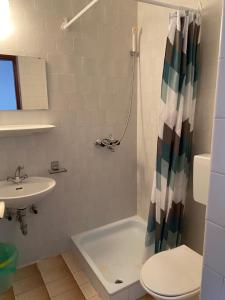 Koupelna v ubytování Apartmani Infinity