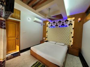 Postelja oz. postelje v sobi nastanitve Hotel Sea World Cox's Bazar