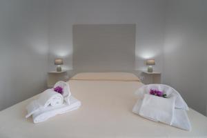 Letto o letti in una camera di Hotel Cannamele Resort