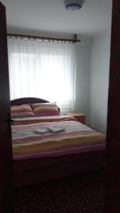 Giường trong phòng chung tại Apartman Tamara