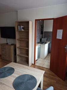 Kuchyňa alebo kuchynka v ubytovaní Apartamenty Jola