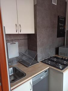 Kuchyňa alebo kuchynka v ubytovaní Apartamenty Jola