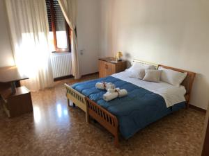 A bed or beds in a room at CasAnna nel cuore del Salento Arnesano LE