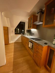 A kitchen or kitchenette at Tatry Fimali Még 15 kép