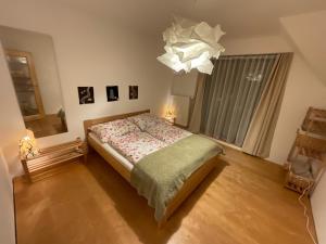 A bed or beds in a room at Tatry Fimali