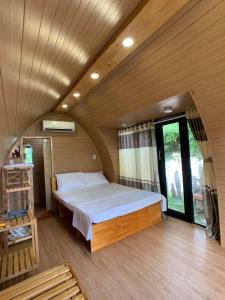Giường trong phòng chung tại HomeStay LyTiSea