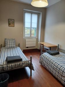 Katil atau katil-katil dalam bilik di Gite Compostella