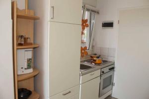 Kuchyňa alebo kuchynka v ubytovaní Apartment in Trogir with sea view, terrace, air conditioning, WiFi 4328-5
