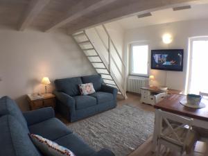 A seating area at Attico Fronte Mare nel Borgo di Celle Ligure