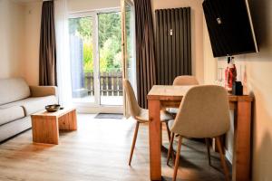 TV a/nebo společenská místnost v ubytování Smart Resorts Haus Azur Ferienwohnung 806