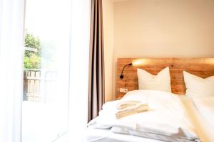 Postel nebo postele na pokoji v ubytování Smart Resorts Haus Azur Ferienwohnung 806
