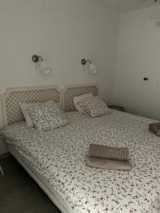 Кровать или кровати в номере Casa Acqua
