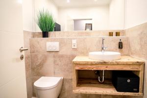 Koupelna v ubytování Smart Resorts Haus Topas Ferienwohnung 304 + 8 fotografií