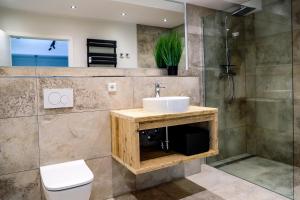 Koupelna v ubytování Smart Resorts Haus Brilliant Ferienwohnung 602 + 17 fotografií