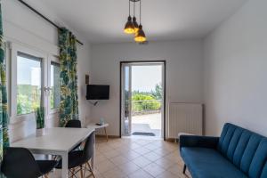 TV a/nebo společenská místnost v ubytování Veranda 2-Guest Apartment