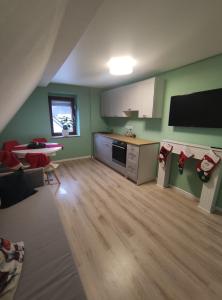 Kuchyň nebo kuchyňský kout v ubytování Gasthaus L&A Kunz + 25 fotografií