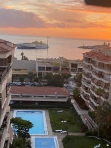 a view of a city with a cruise ship in the water at Casa Eneri in Los Cristianos