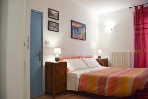 A bed or beds in a room at Il Nido del Canterino