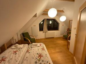 A bed or beds in a room at Tatry Fimali