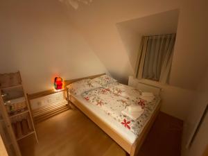 A bed or beds in a room at Tatry Fimali