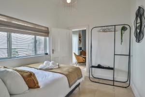 Posteľ alebo postele v izbe v ubytovaní Beaumont Cottages 2 by CTHA