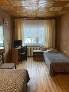 Postel nebo postele na pokoji v ubytování Helge Guest Apartment