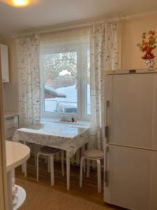 Kuchyň nebo kuchyňský kout v ubytování Helge Guest Apartment