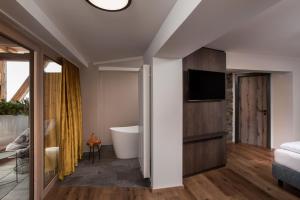 Posteľ alebo postele v izbe v ubytovaní Hotel Das Kohlmais