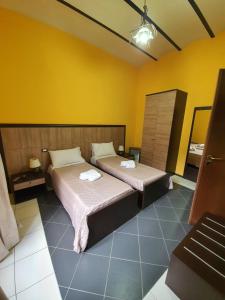Postel nebo postele na pokoji v ubytování B&B 13