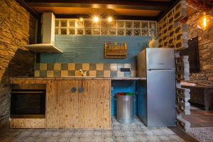 Kuchyň nebo kuchyňský kout v ubytování Casa Pairal Jarca - dúplex - a 1 km de Canillo - HUT 8063