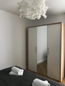 Posteľ alebo postele v izbe v ubytovaní Apartamenty Julia APARTAMENTY OZONOWANE