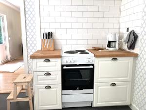 Kjøkken eller kjøkkenkrok på Lilla Halängen cottages