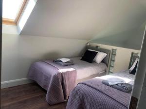 Postel nebo postele na pokoji v ubytování Muckruss Lodge Clonakilty An Oasis of Tranquility