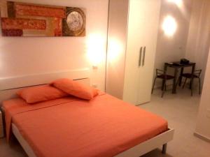 En eller flere senge i et værelse på Ipanema Suite