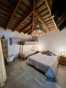 Llit o llits en una habitació de Casa Bali Vichayito
