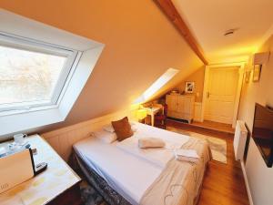 Letto o letti in una camera di Gewerkenschlössl Zeilinger