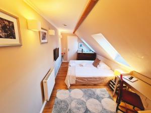 Letto o letti in una camera di Gewerkenschlössl Zeilinger