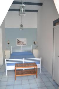 A bed or beds in a room at Casa Carmela