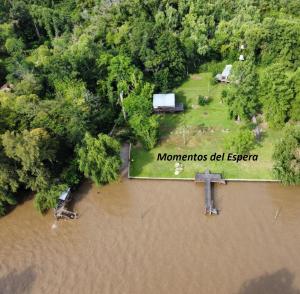 an aerial view of a river with a sign that reads memories del ecrem at Momentos del Espera in Tigre