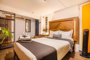 Katil atau katil-katil dalam bilik di Nomadier Experience Mexico City Condesa